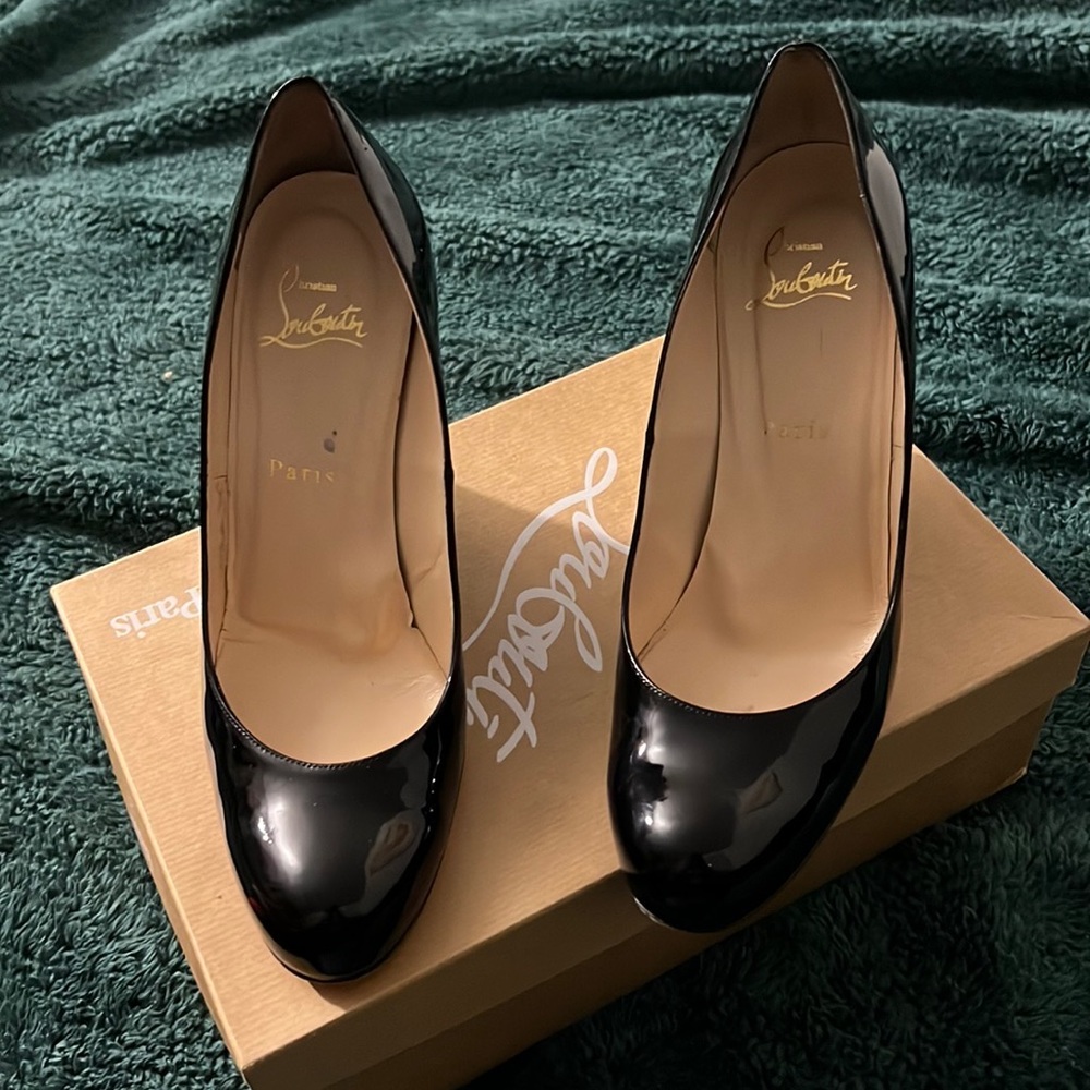 Authentic Christian Louboutin size 38 (close to 7.5/8 US)
